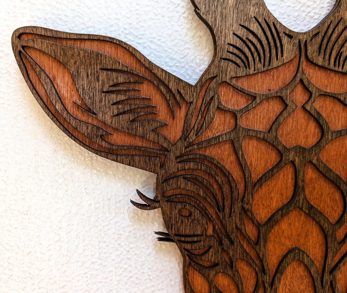Handcrafted 3D giraffe head wood wall art with layered design