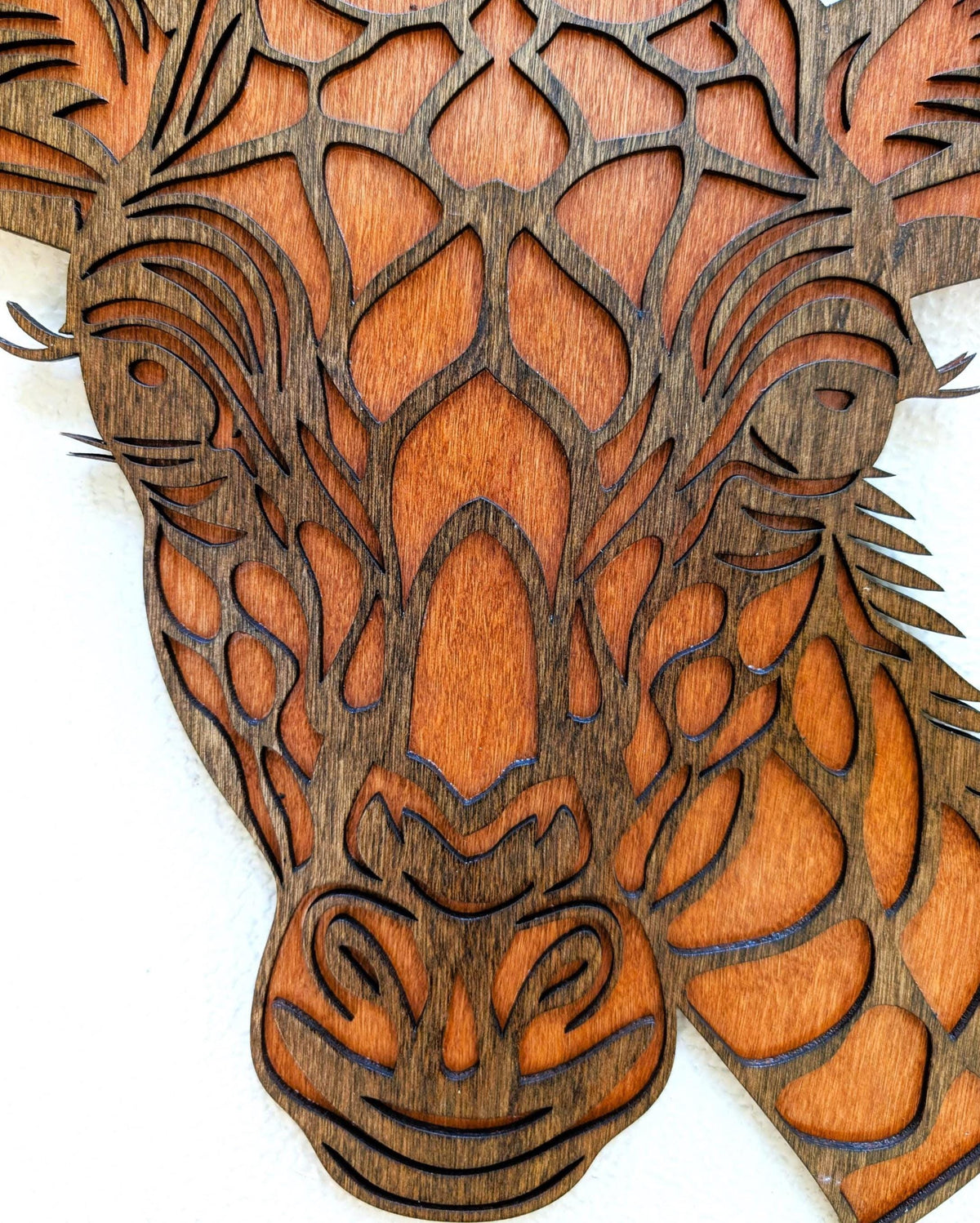3D giraffe head wood wall art with layered laser-cut details