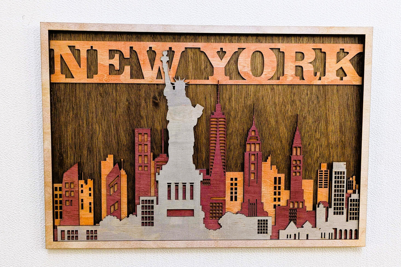 Wooden wall art with 'NEW YORK' and city skyline