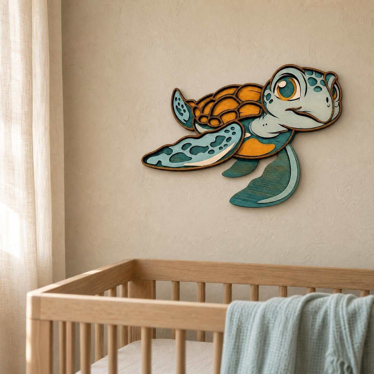 Handcrafted baby sea turtle wood wall art with layered colorful details for coastal nursery decor