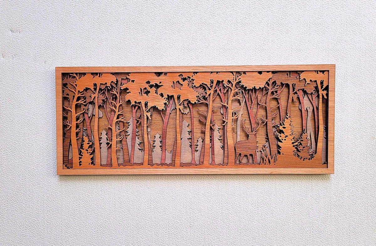 Big Buck in the Forest layered wood wall art in warm brown tones, featuring a deer among carved trees