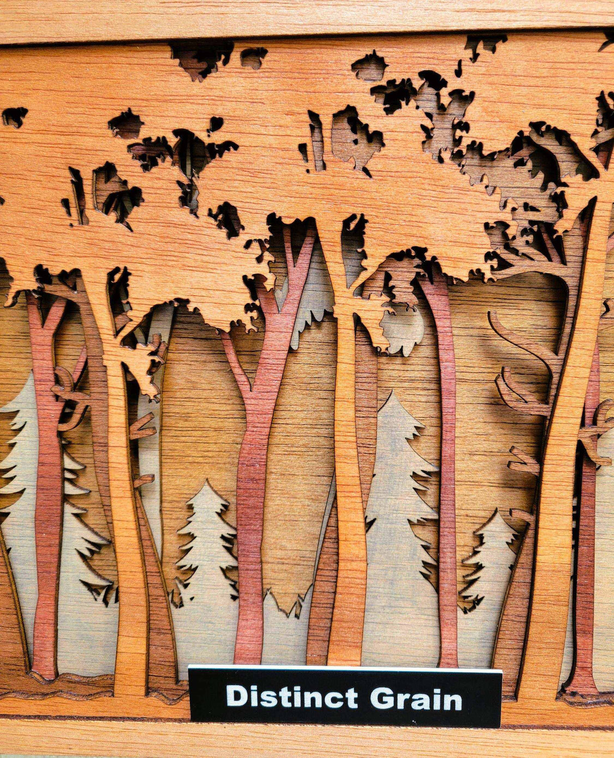 Big Buck in the Forest layered wood wall art with natural grain, carved trees, and multicoloured stained woodland details