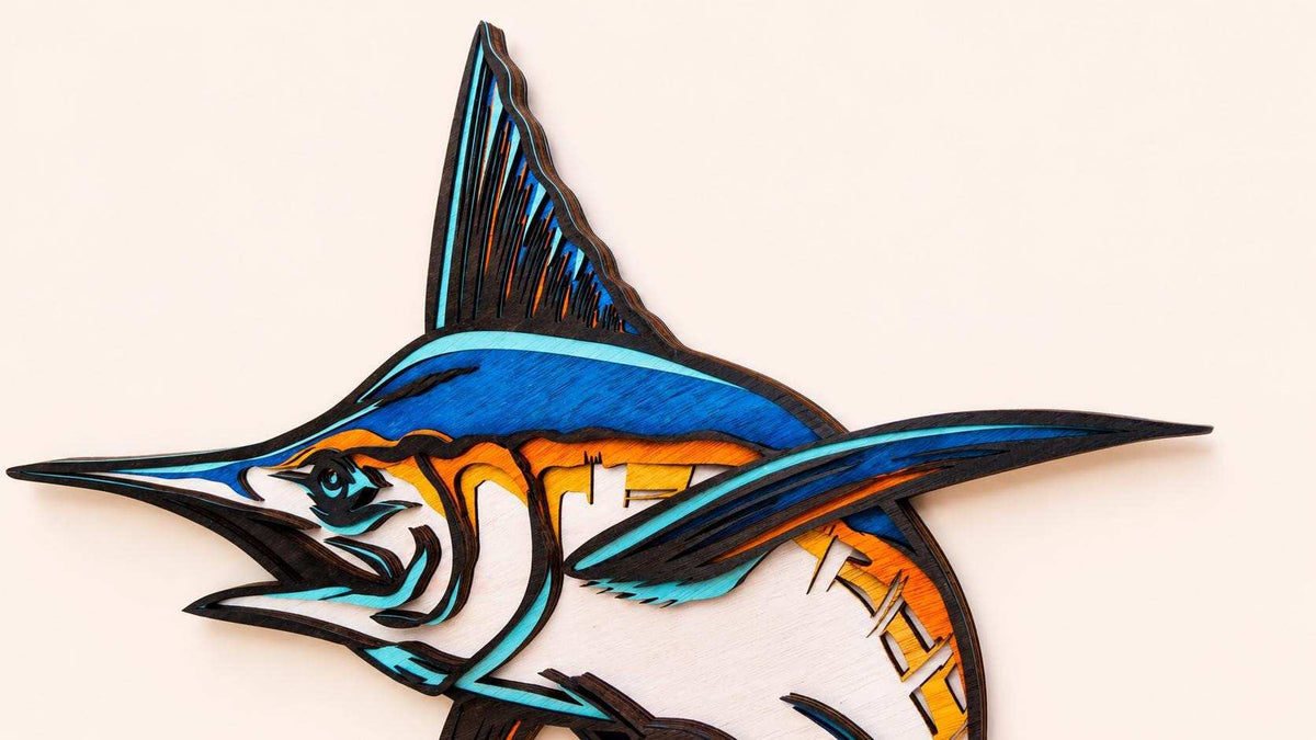 Handcrafted blue marlin layered wood wall art for coastal decor
