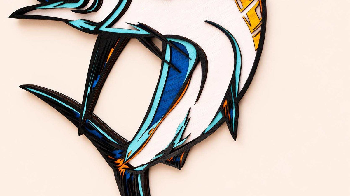 Handcrafted blue marlin layered wood wall art with coastal nautical design