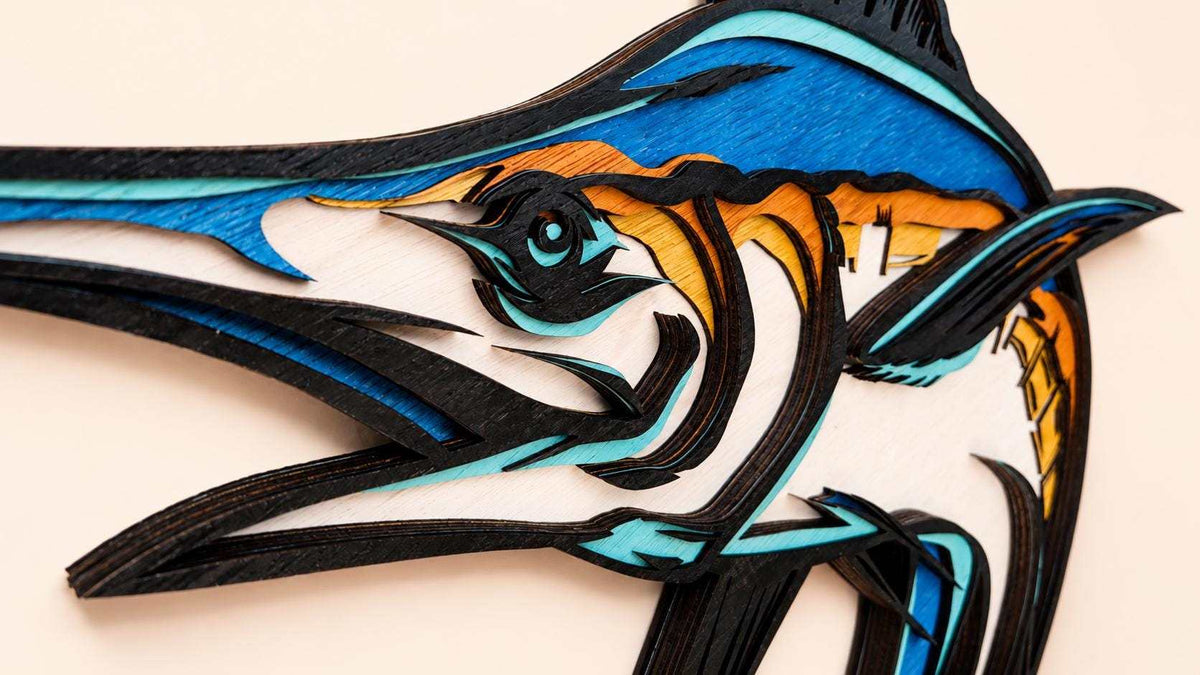 Handcrafted blue marlin layered wood wall art with coastal nautical decor