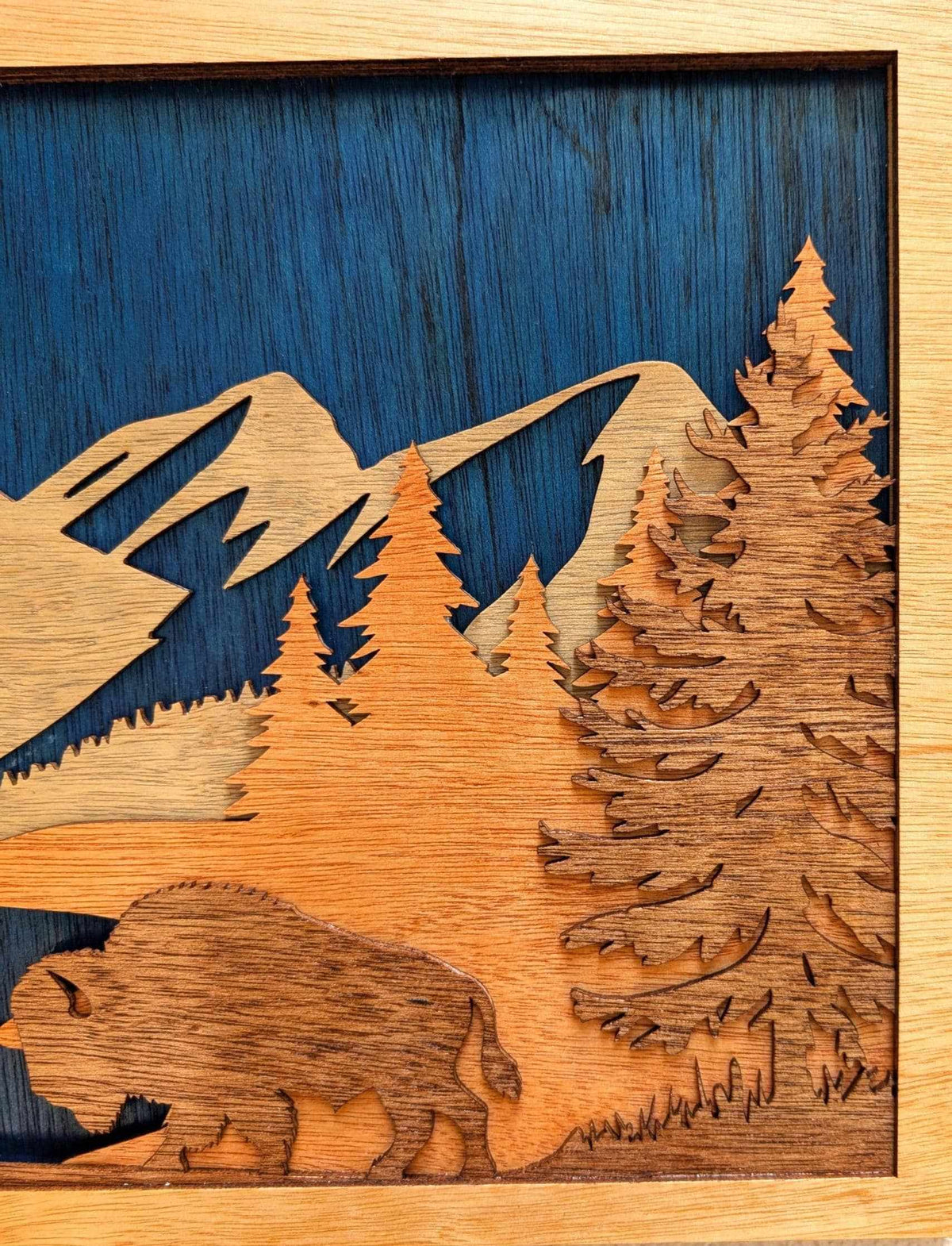 3D wooden Buffalo Mountain Scene wall art with layered buffalo, mountains, trees, and lake in natural wood tones