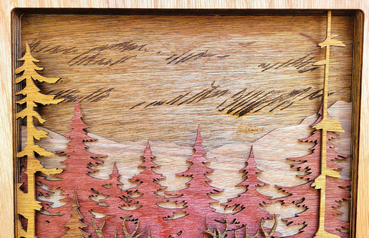 Elk & Buck Woodland Forest Wall Art featuring layered stained wood trees in red, gold, and natural tones
