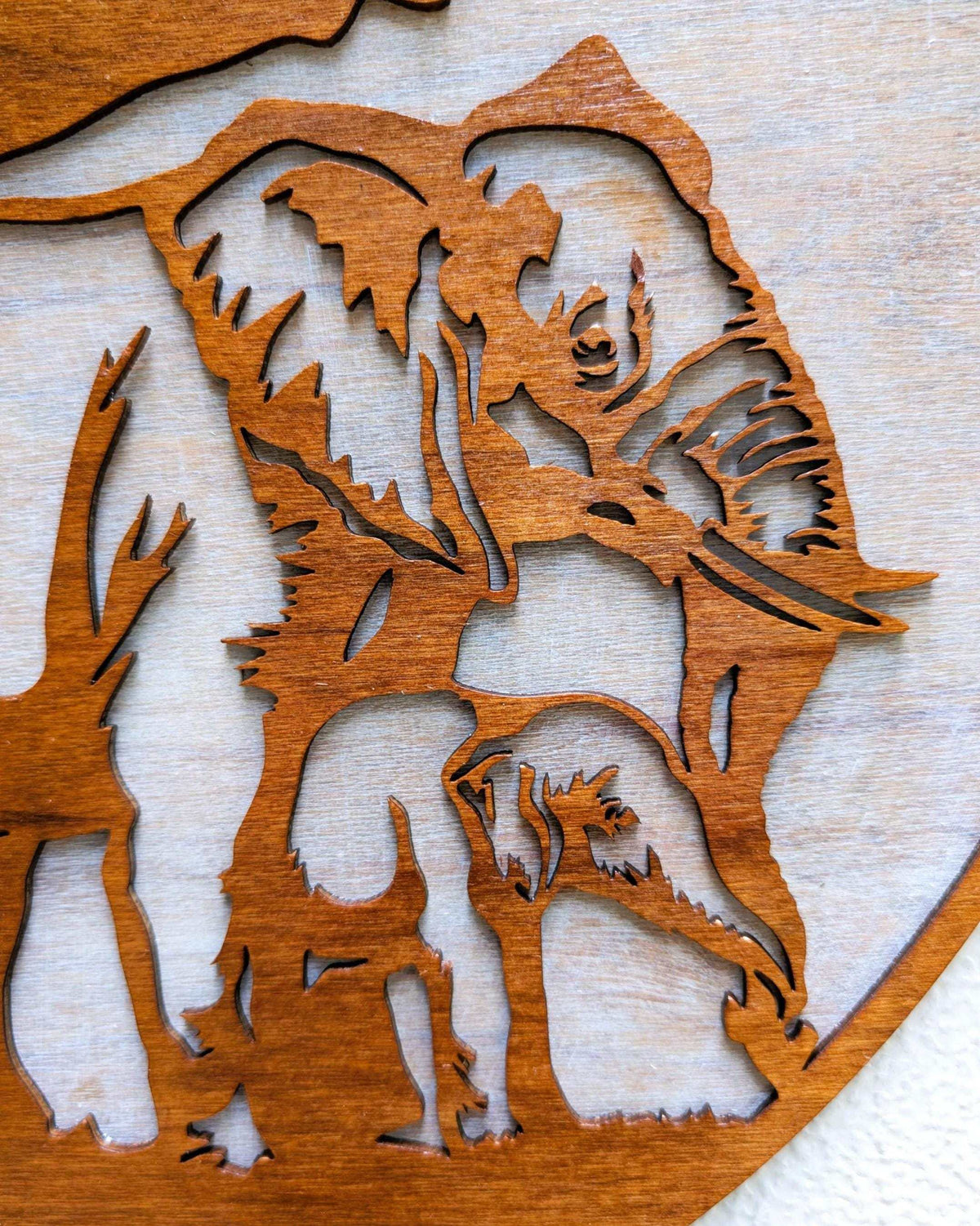 Handcrafted wooden jungle scene wall art featuring mama and baby elephants under African acacia tree
