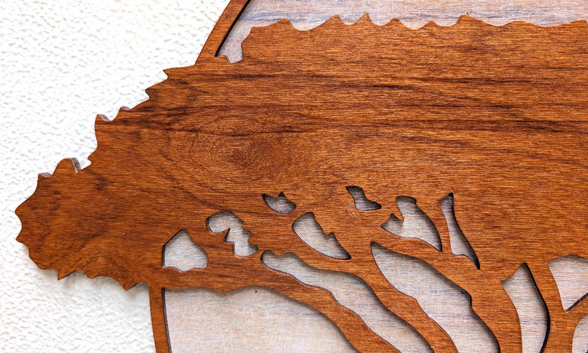 Jungle scene wood wall art featuring mama and baby elephants under an African acacia tree