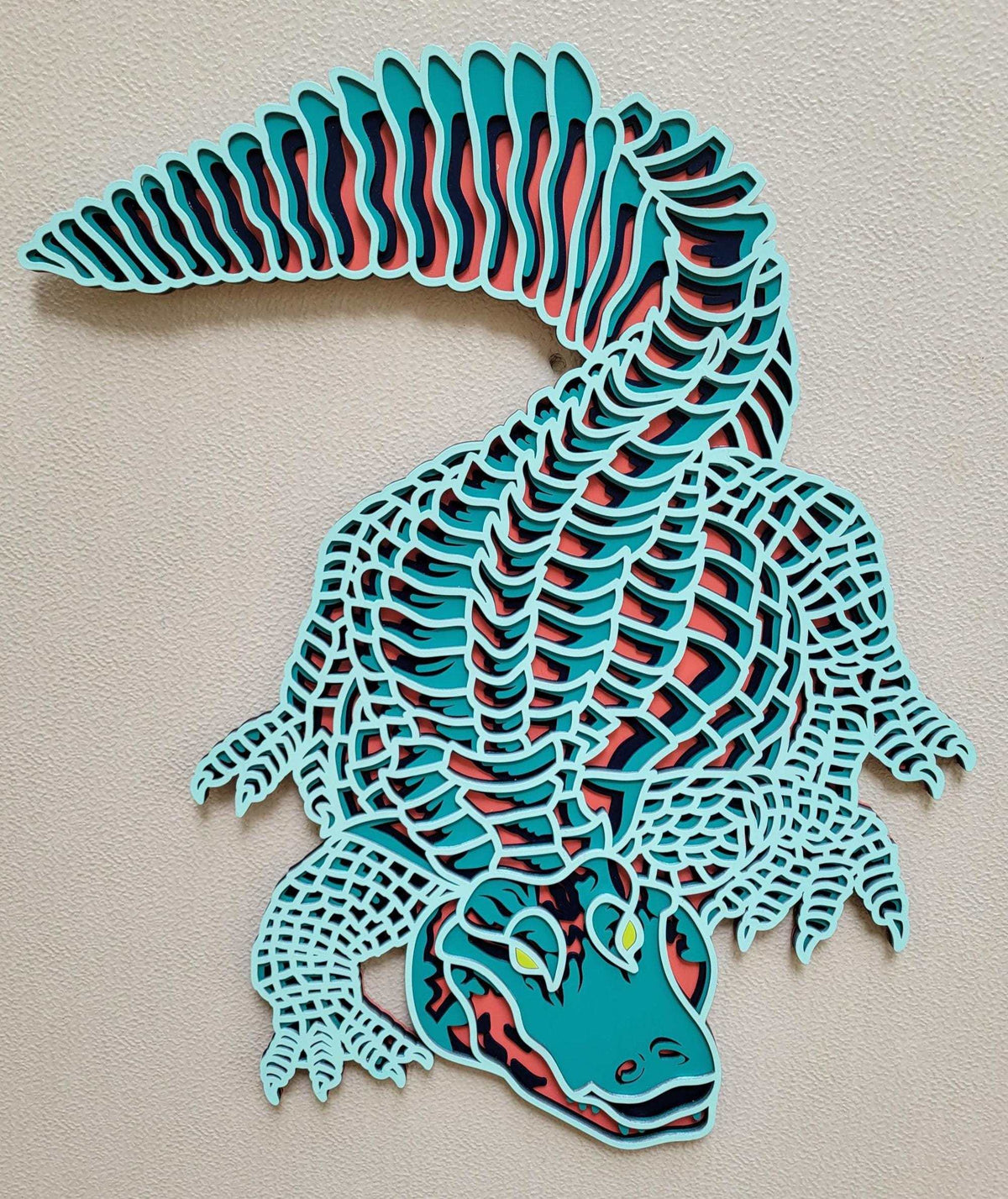 Layered Alligator Wall Art in turquoise, red, and black wood with intricate skeletal layers and detailed face
