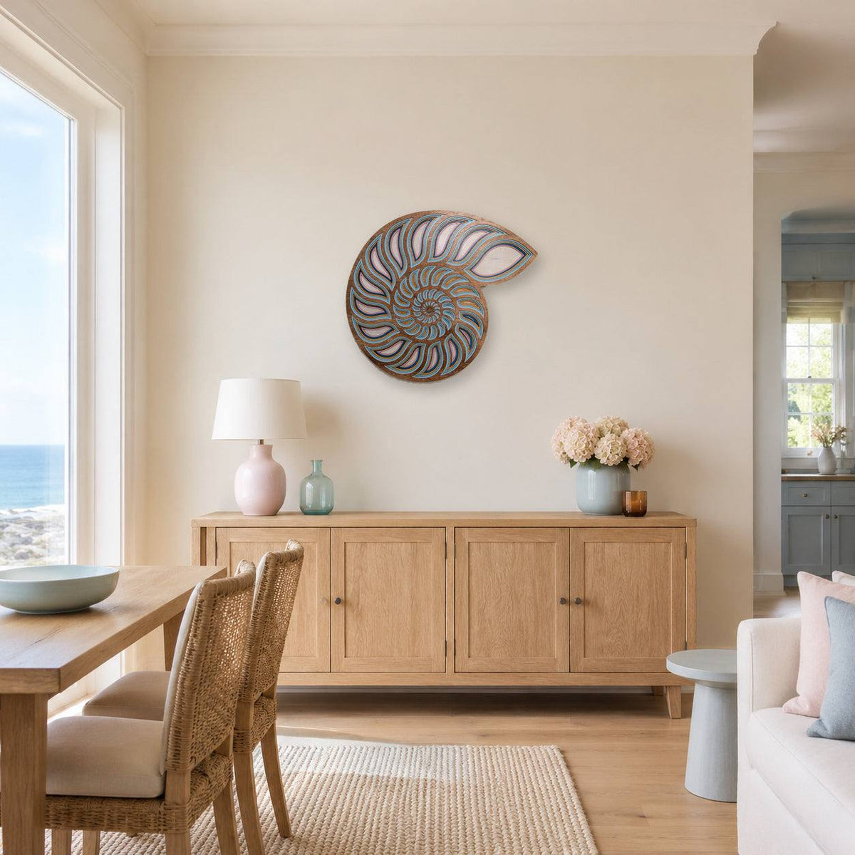 Layered nautilus shell wood wall art with coastal ocean decor colors and intricate spiral design
