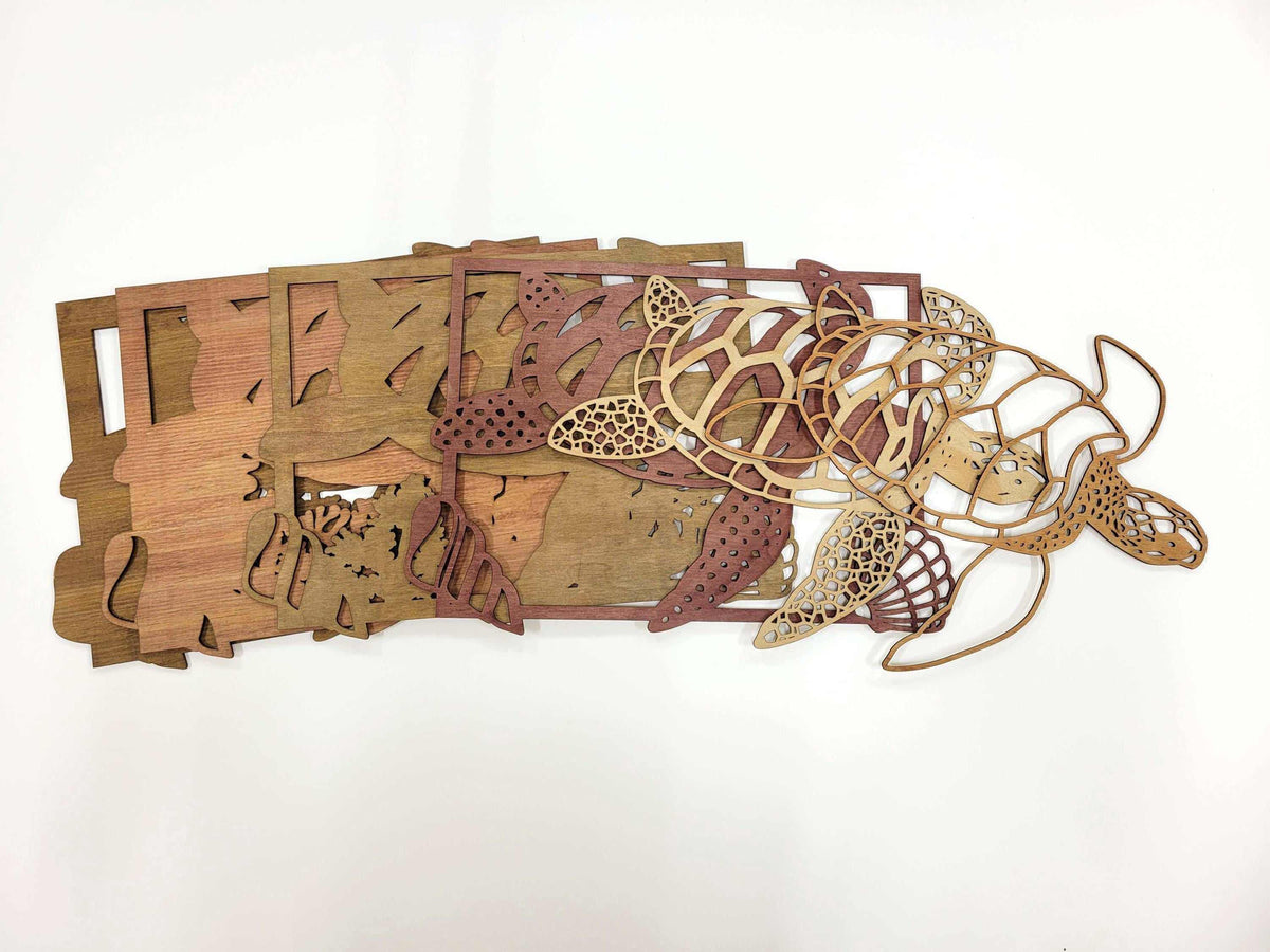 Layered Sea Turtle Wall Art in natural wood tones, featuring a detailed turtle over layered reef and sea-life cutouts