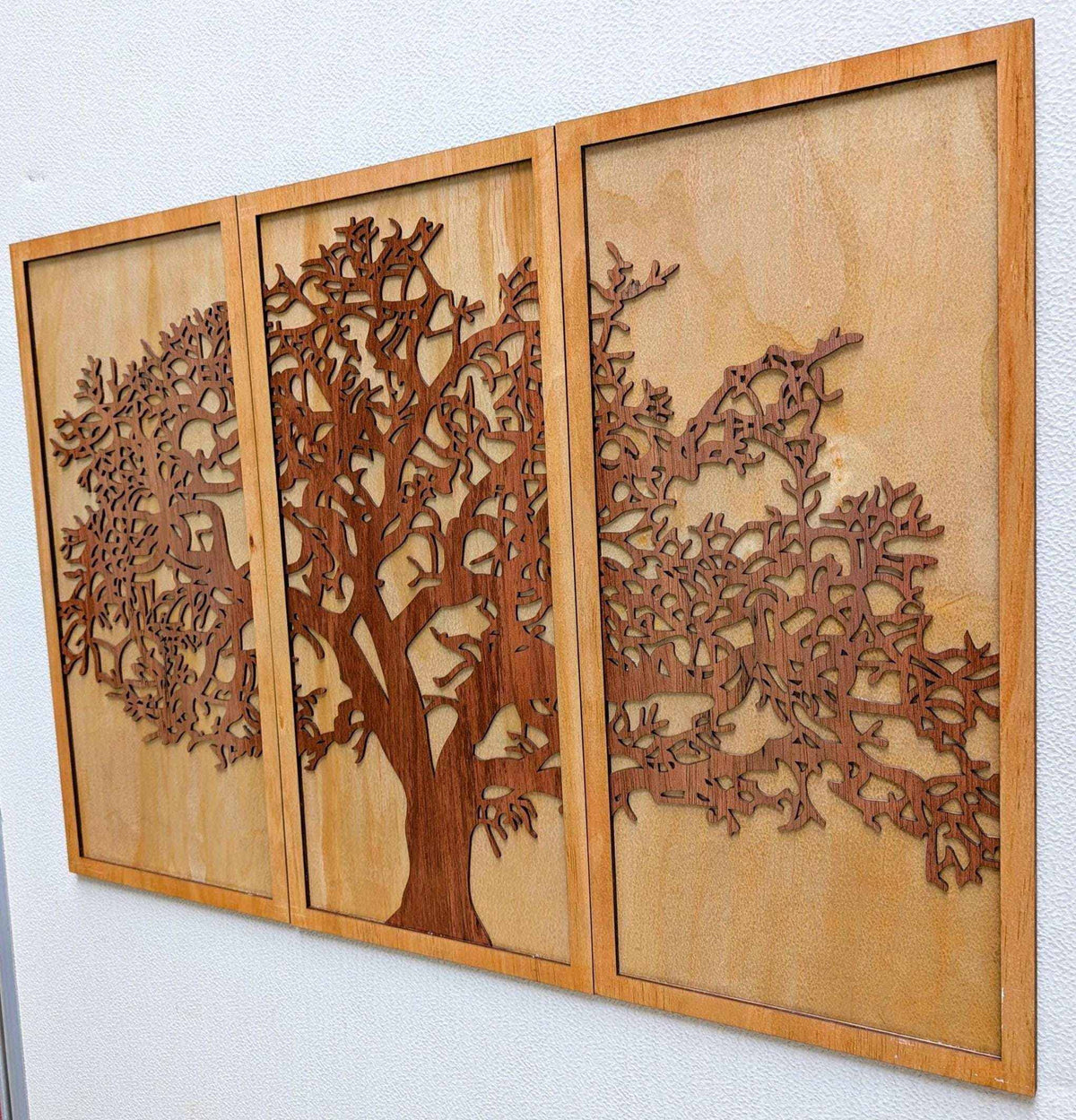 Layered Tree of Life wood wall art in three framed panels, featuring a detailed brown branching tree design