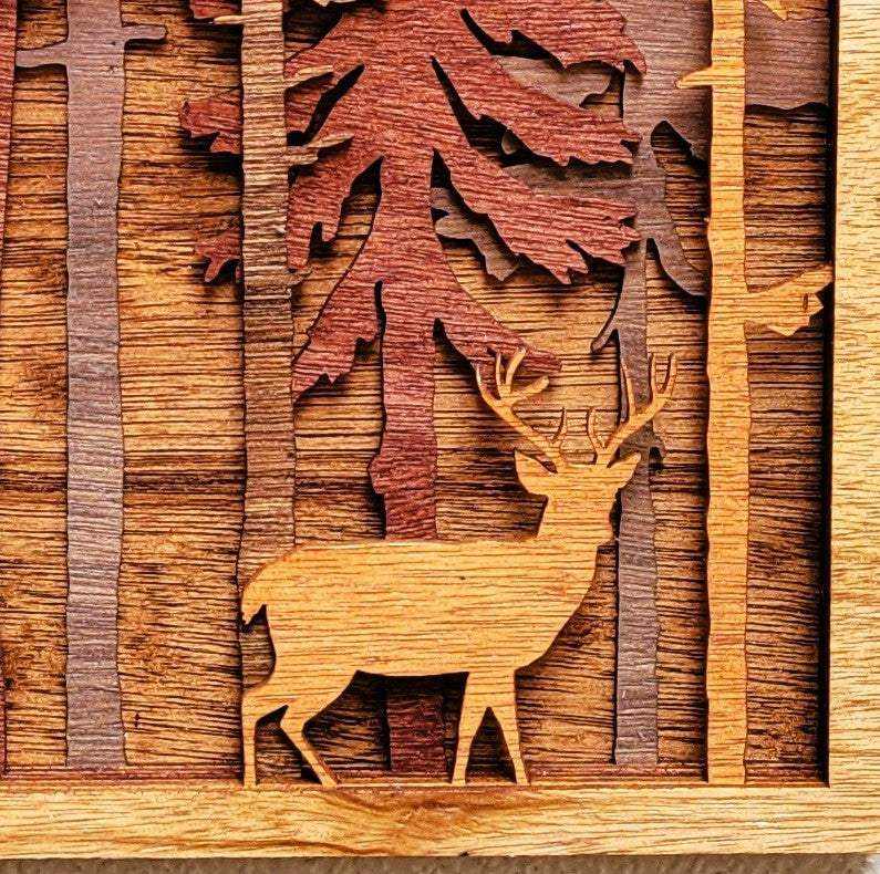 Woodland Deer Forest Shadow Box featuring layered natural wood with a golden buck among tall pine trees